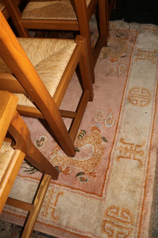 A Chinese pink ground rug